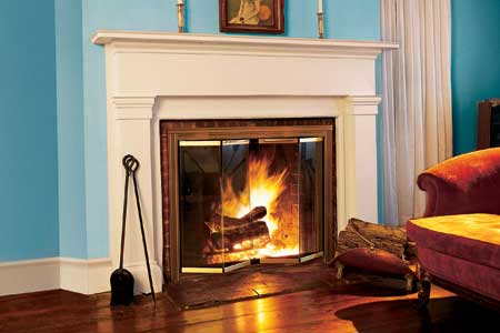 Installing fireplace doors is one way to improve efficiency. Image via www.thisoldhouse.com