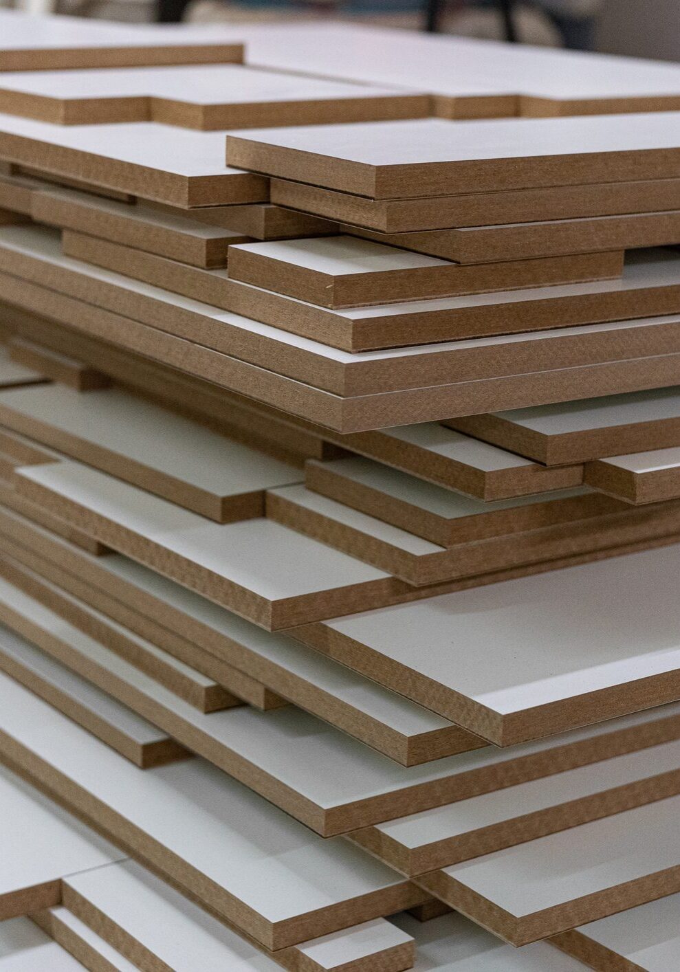 Stacked wooden boards in workshop